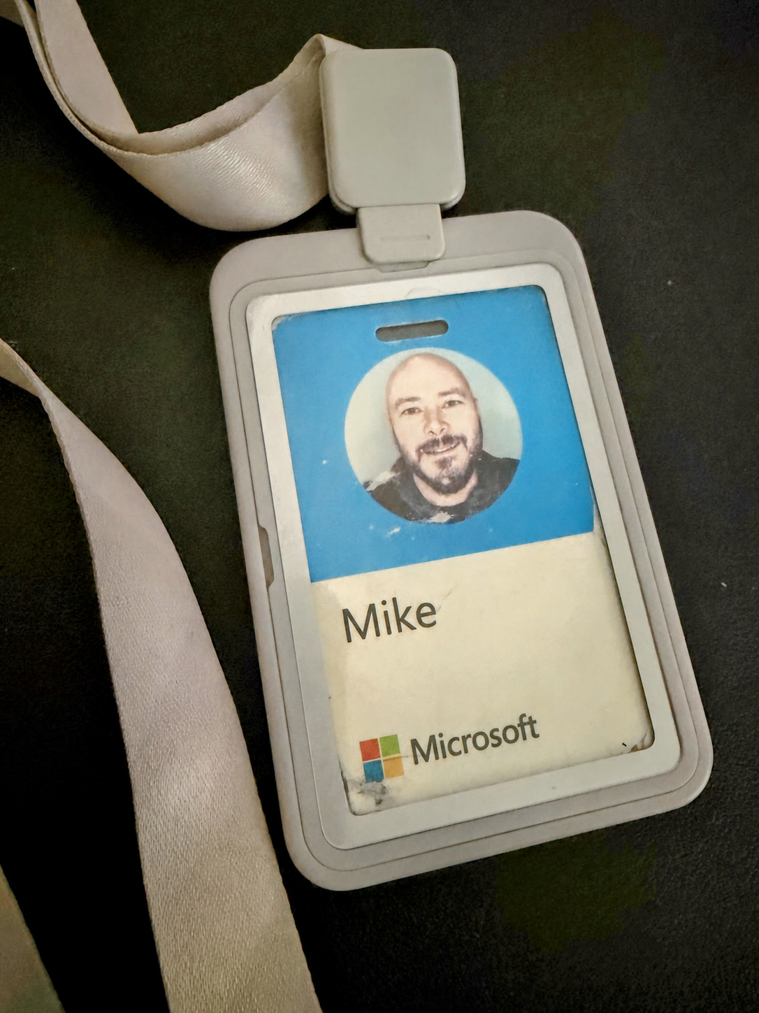 Mike Stevens's latest worn Microsoft employee badge, one of several replacement badges collected over the years