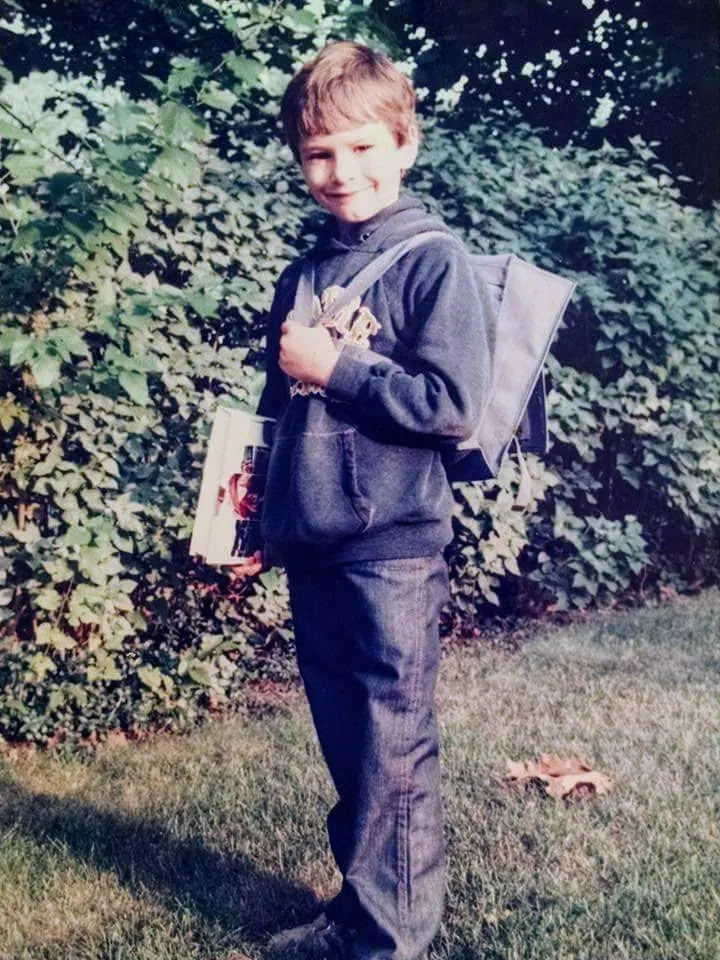 Young Mike with a backpack
