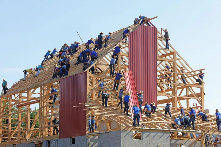Team building a structure together