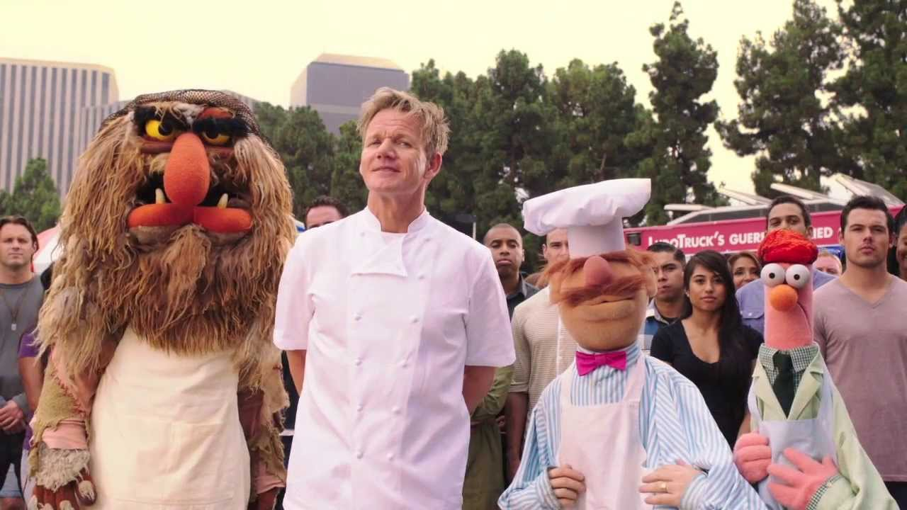 Gordon Ramsay standing with the Swedish Chef, Beaker, and Sweetums from The Muppets